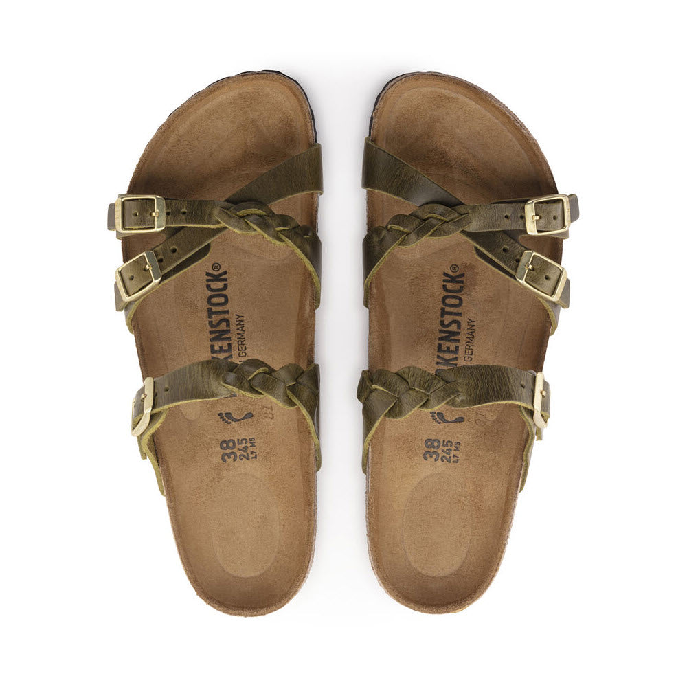 A pair of Birkenstock FRANCA BRAID GREEN OILED - WOMENS sandals featuring oiled nubuck leather straps in olive green, viewed from above.