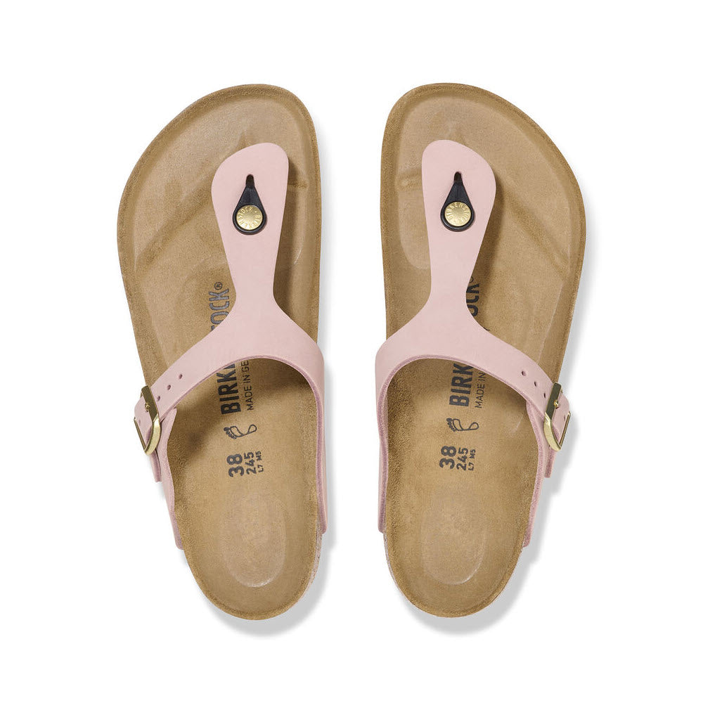 A pair of pink nubuck leather Birkenstock Gizeh Soft Pink sandals viewed from above, showing contoured cork-latex footbeds and adjustable straps.