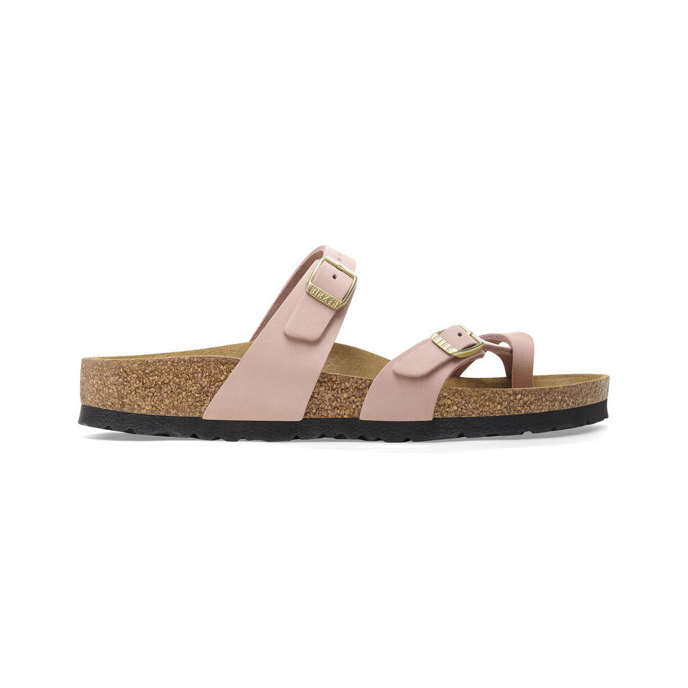 A pair of Birkenstock Mayari Soft Pink sandals with buckle straps and a cork-latex footbed, isolated on a white background.