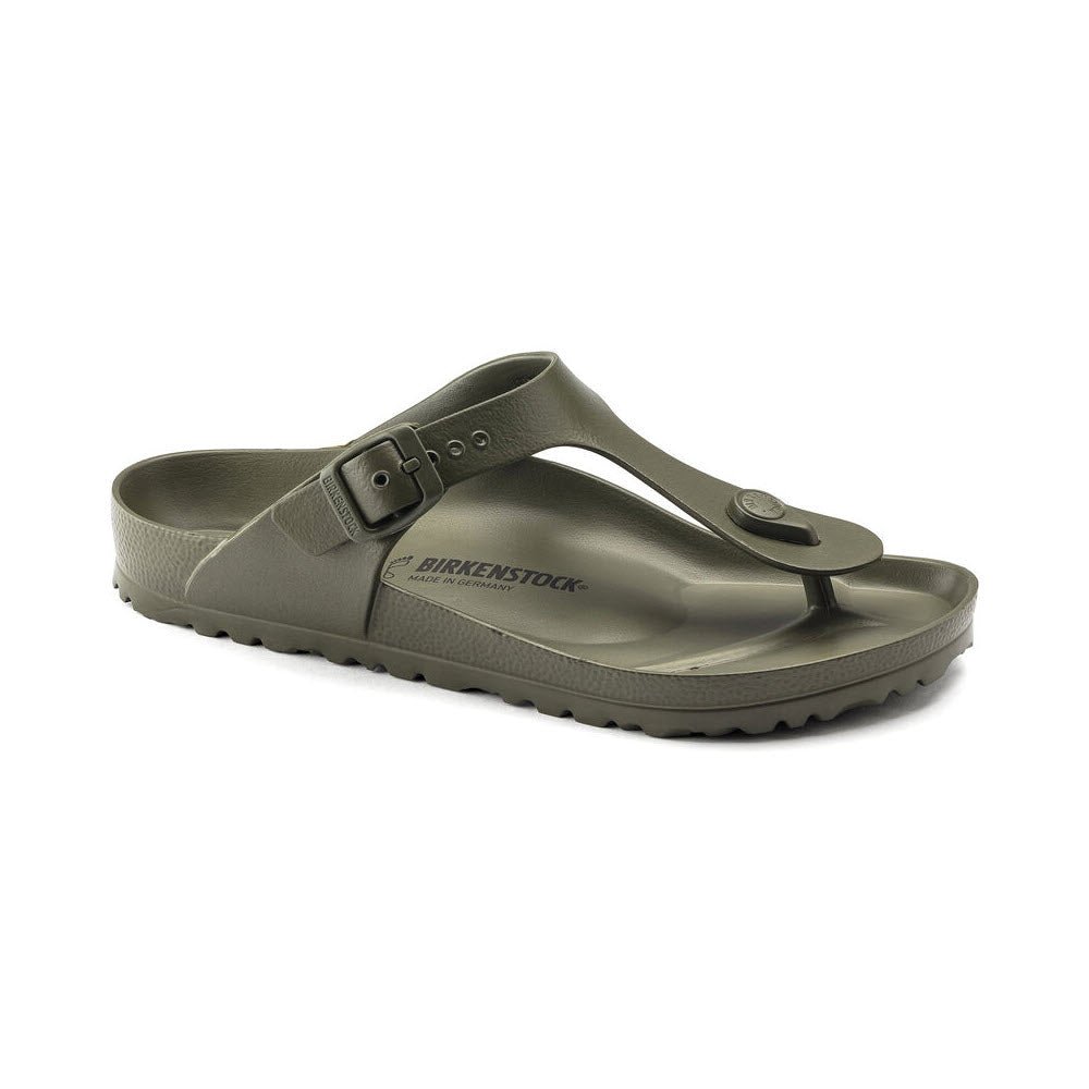 Olive green BIRKENSTOCK GIZEH EVA sandal with a single strap and buckle on a white background, featuring an anatomically shaped footbed.
