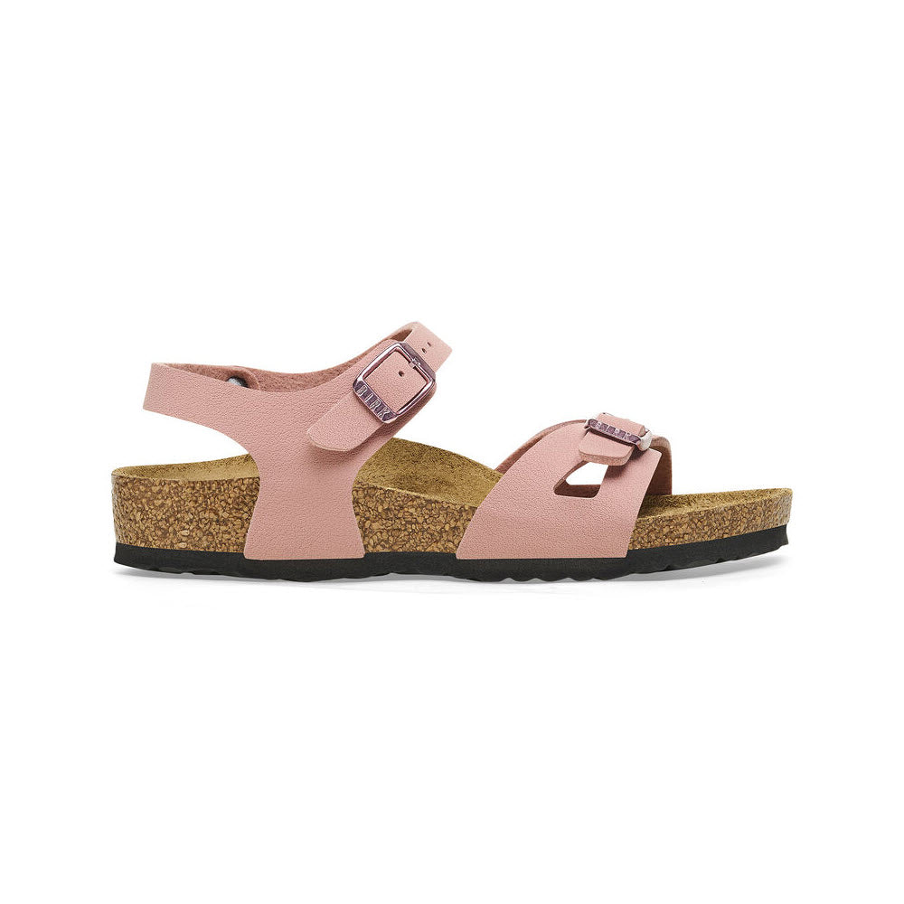A pair of pink BIRKENSTOCK RIO PINK CLAY BIRKIBUC sandals with adjustable ankle straps and cork soles, isolated against a white background.