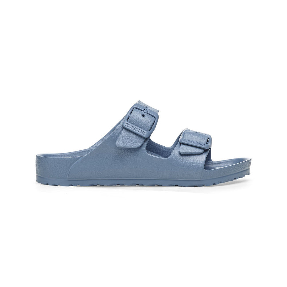 A single Birkenstock Arizona EVA Elemental Blue - Kids sandal with two adjustable straps, set against a white background.