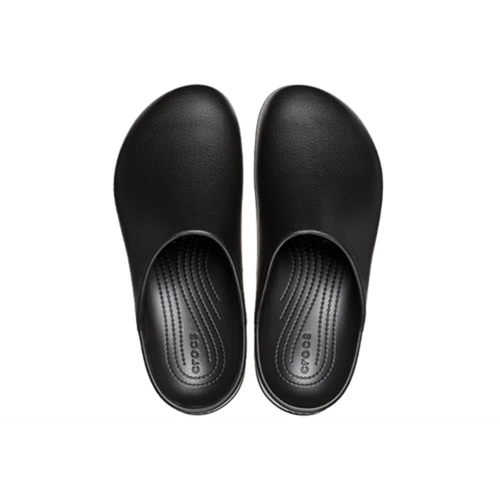 A pair of Crocs Dylan Clog Black shoes viewed from the top against a white background, featuring Iconic Crocs Comfort.