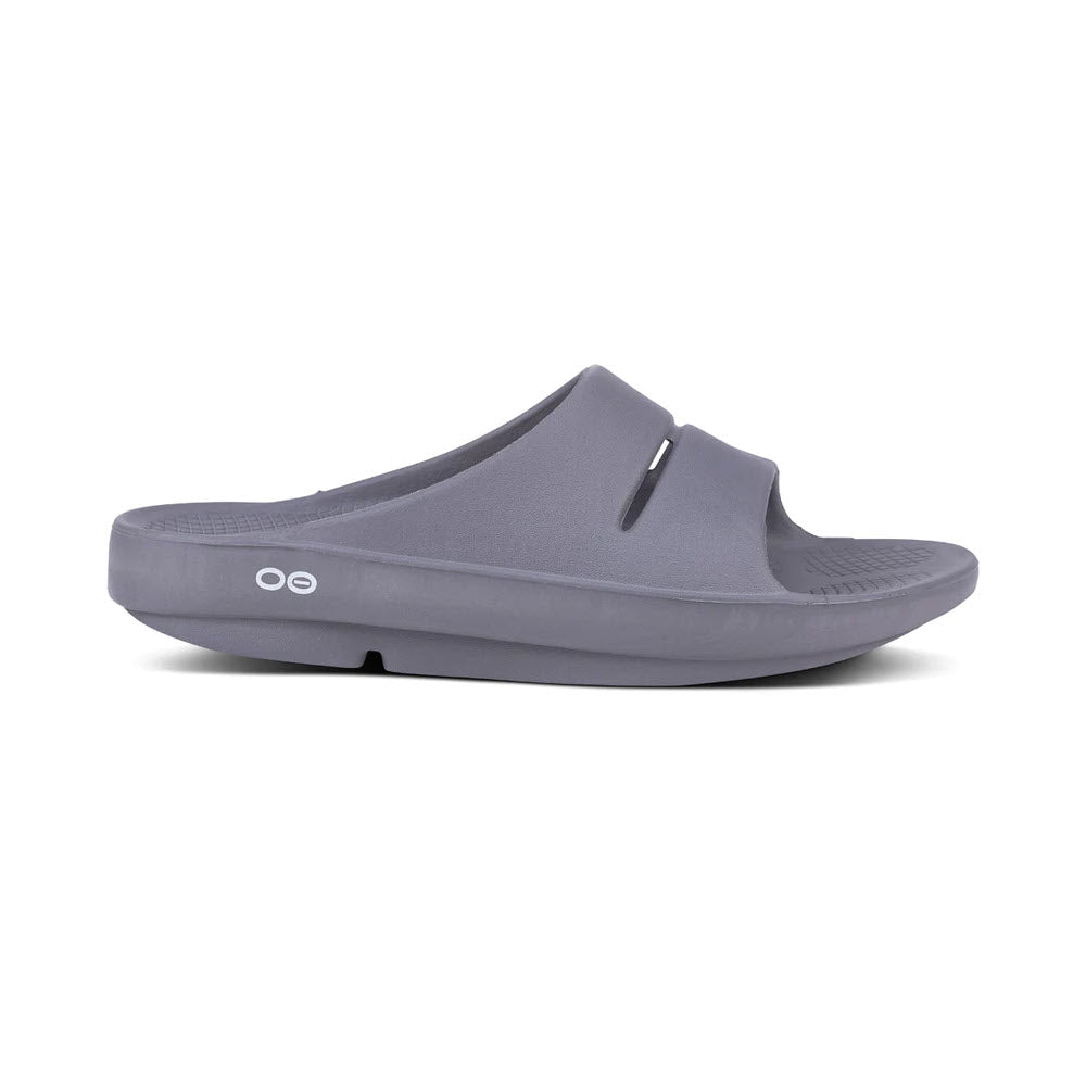 Single OOFOS OOAHH SLATE - MENS sandal with OOfoam technology, featuring a thick sole and a strap over the top, isolated on a white background.