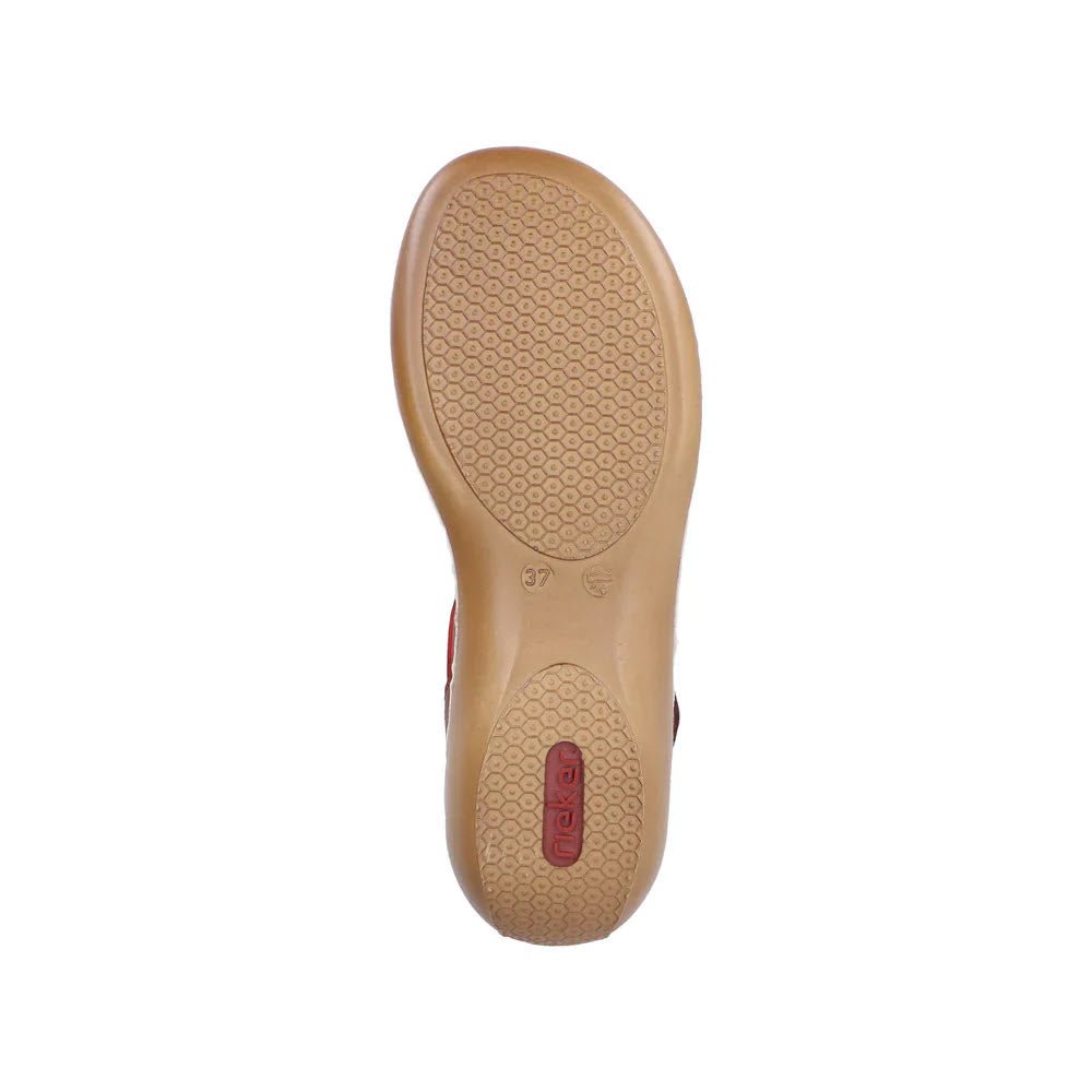 Bottom view of a Rieker shoe showing a tan, shock-absorbing sole with circular tread pattern and a size label marked &quot;37&quot; with a red logo.