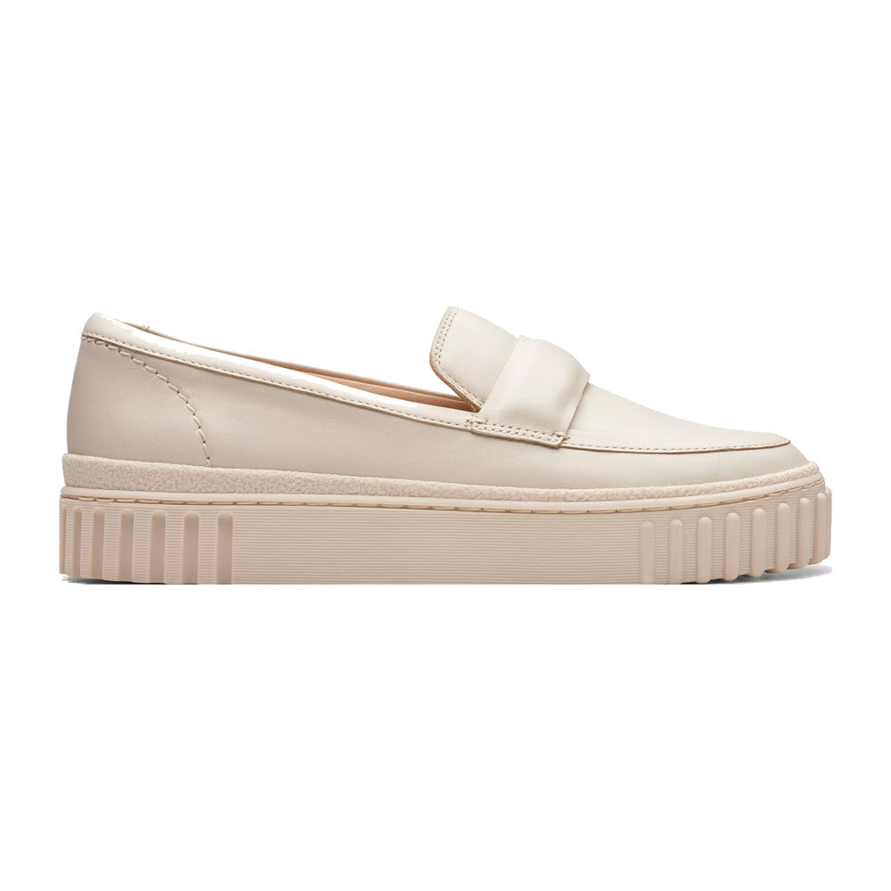 A Clarks Mayhill Cove Cream Leather - Womens platform loafer with a thick, ribbed outsole and a smooth upper design.