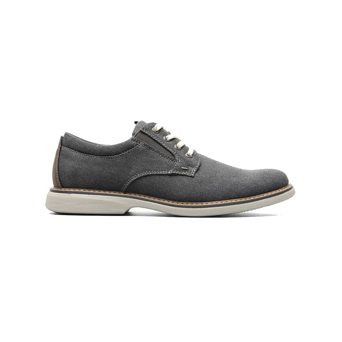 A single Nunn Bush Otto Canvas Plain Toe Oxford Gunmetal shoe with white sole and brown leather details, displayed against a white background.