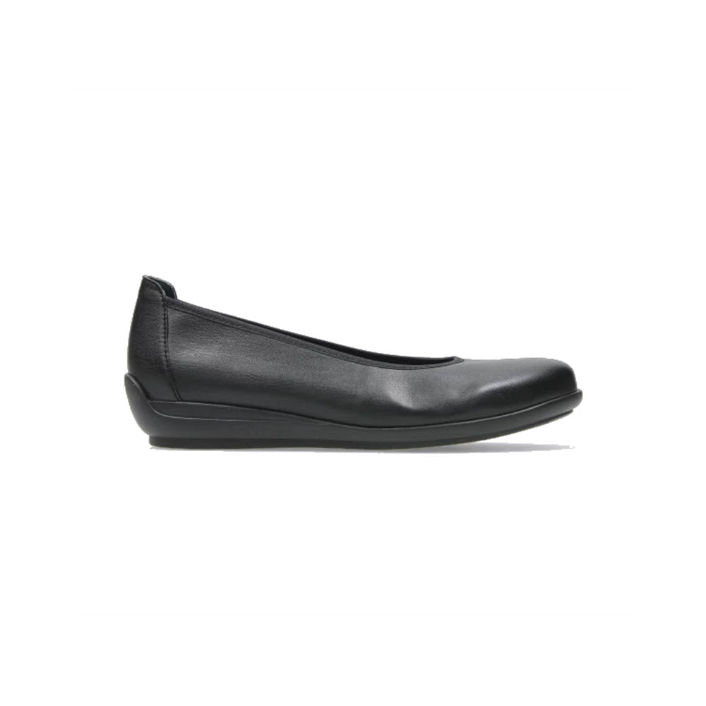 A Wolky black leather ballet flat shoe with a flexible rubber sole displayed against a white background.