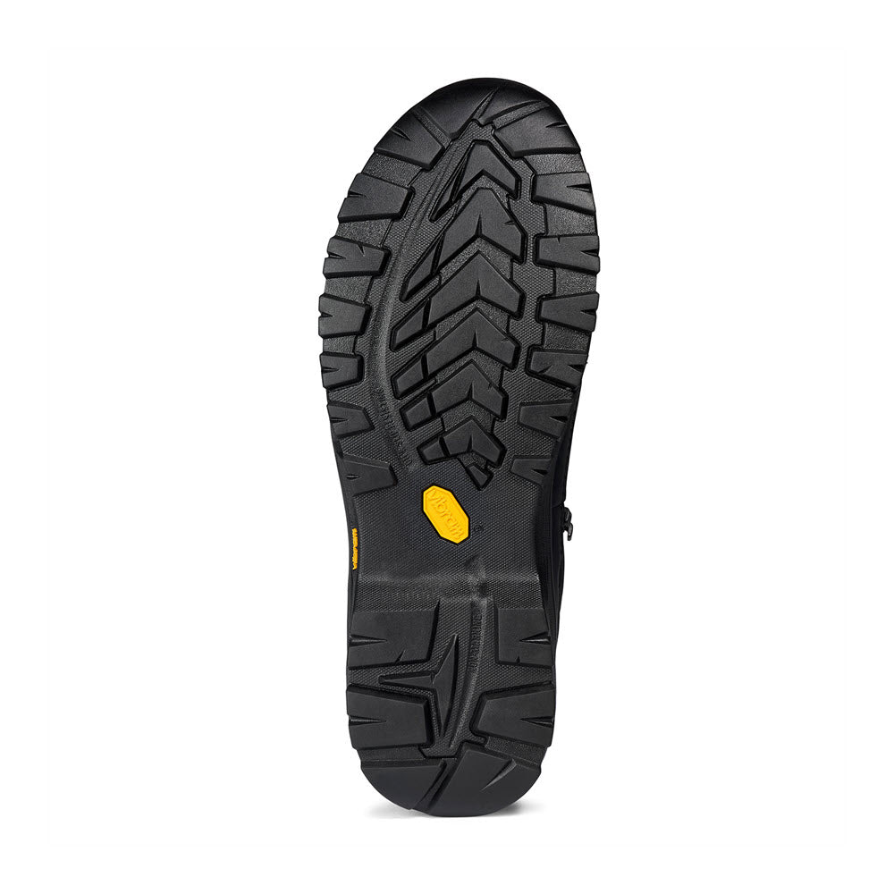 Black Kodiak rugged hiking boot sole with a distinct tread pattern and a visible yellow logo.