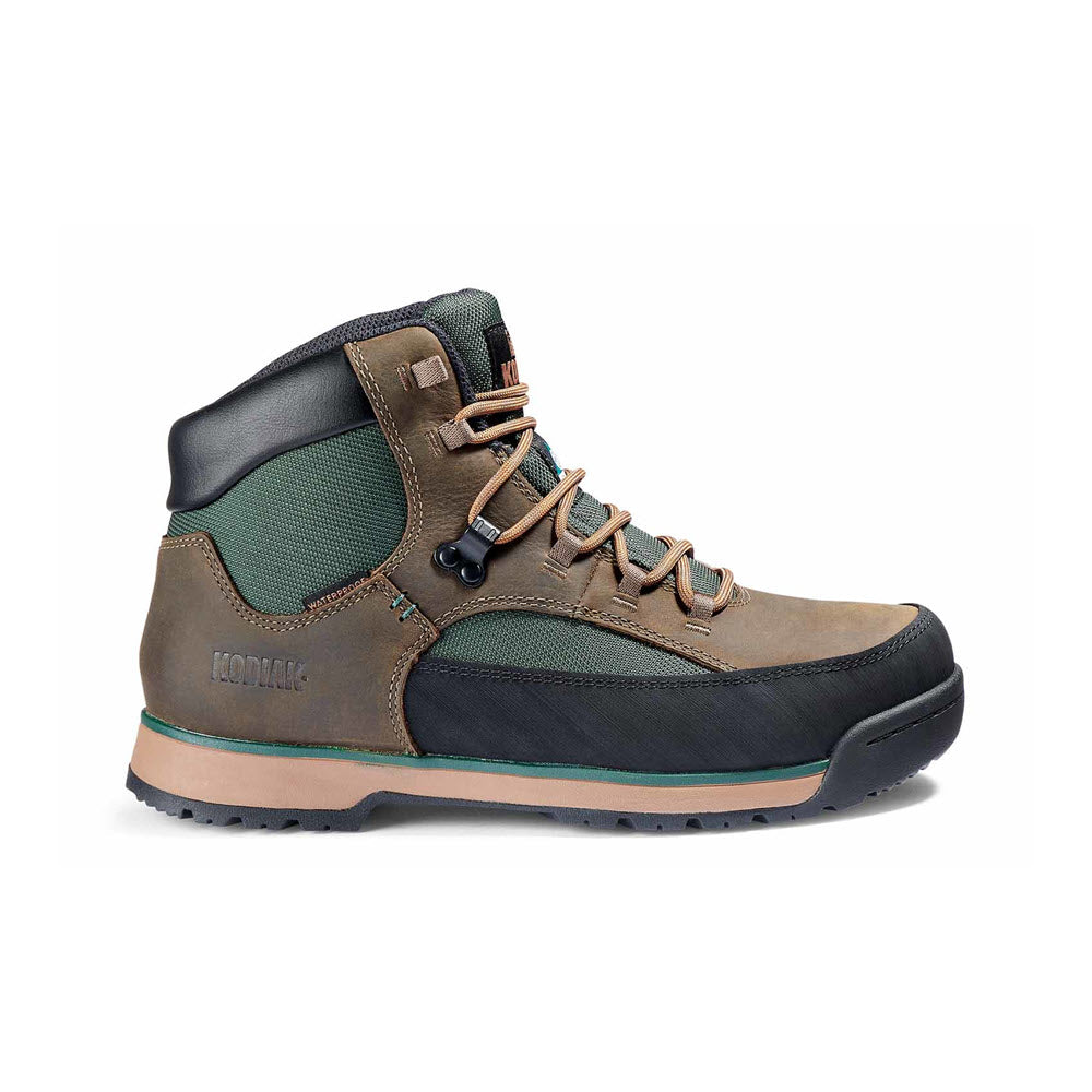 A rugged hiking boot combining green and brown colors, featuring a high ankle design and waterproof leather by Kodiak.