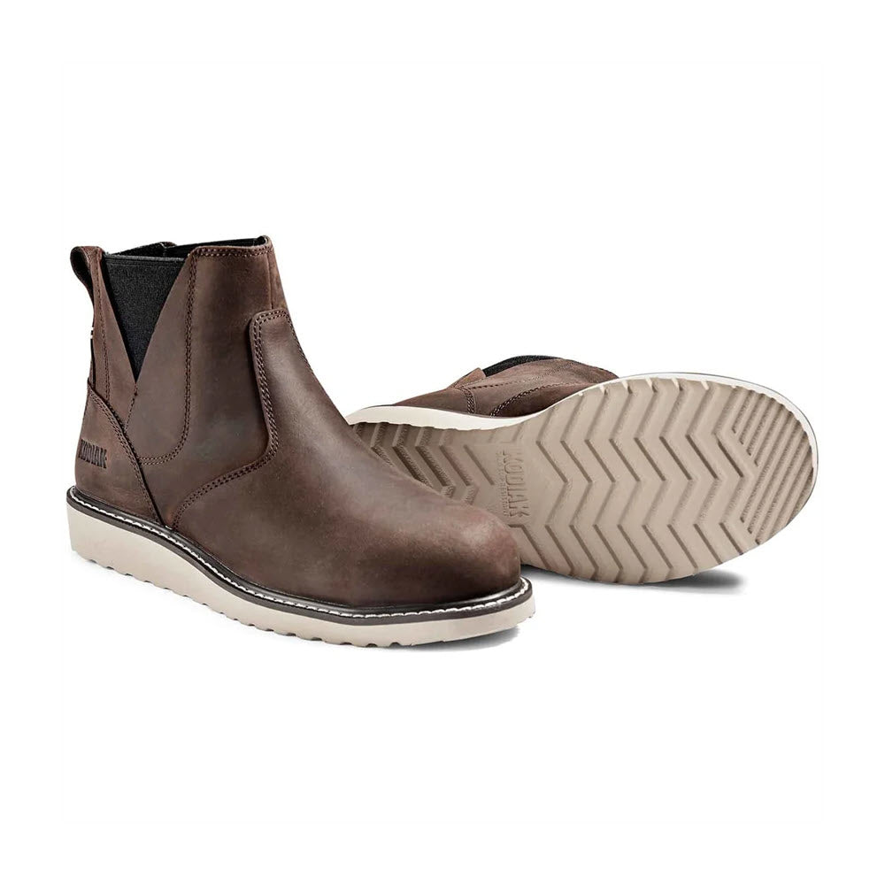 A pair of Kodiak brown leather Whitten Chelsea wedge boots with elastic side panels, slip-resistant outsole, and branded pull tabs positioned against a white background.