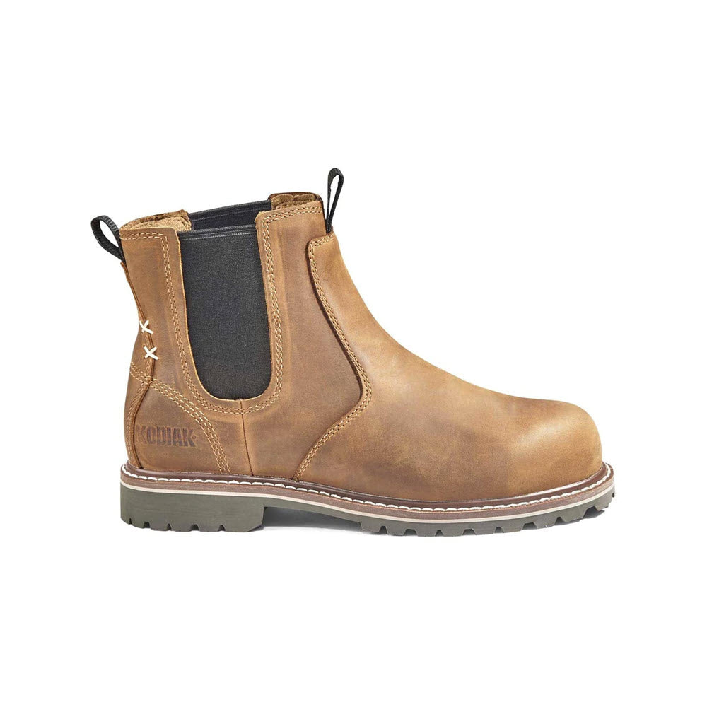 A single tan KODIAK COMPOSITE TOE BRALORNE CHELSEA BROWN - WOMENS boot with elastic side panels and a rugged sole, isolated on a white background.