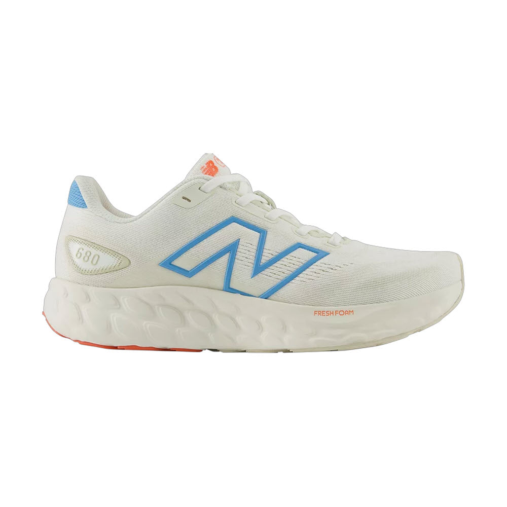 Side view of a white New Balance Sea Salt/Lime Leaf/Coastal Blue - Womens running shoe featuring a blue logo and orange accents on a white background.