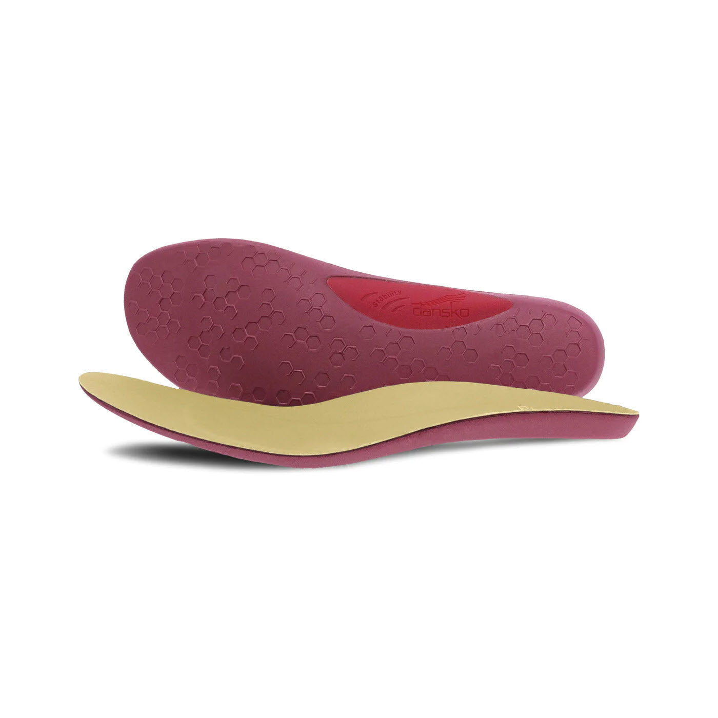 A pair of layered Dansko footbed all day comfort orthotic insoles featuring a maroon top layer and a mustard yellow bottom layer with an arch stabilizer, isolated on a white background.