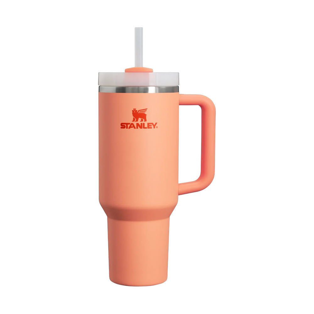 An orange Stanley QUENCHER H2O FS TUMBLER 40 NECTARINE with spill-proof lid, handle and straw on a white background.
