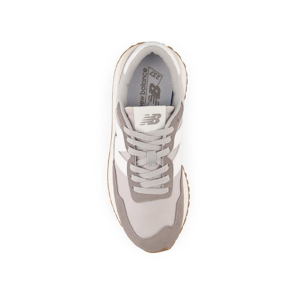 Top view of a gray New Balance WS237 Marblehead running shoe with white laces, viewed against a white background.