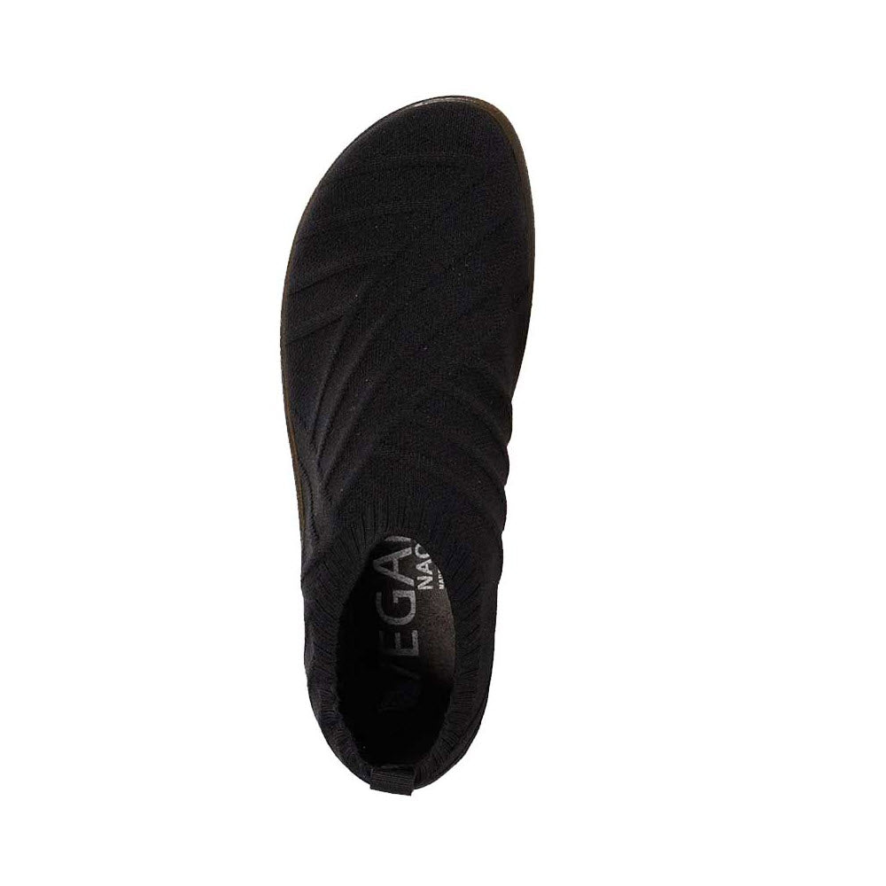 Top view of a black, lightweight sneaker with a textured design and the logo &quot;Naot&quot; visible on the tongue.