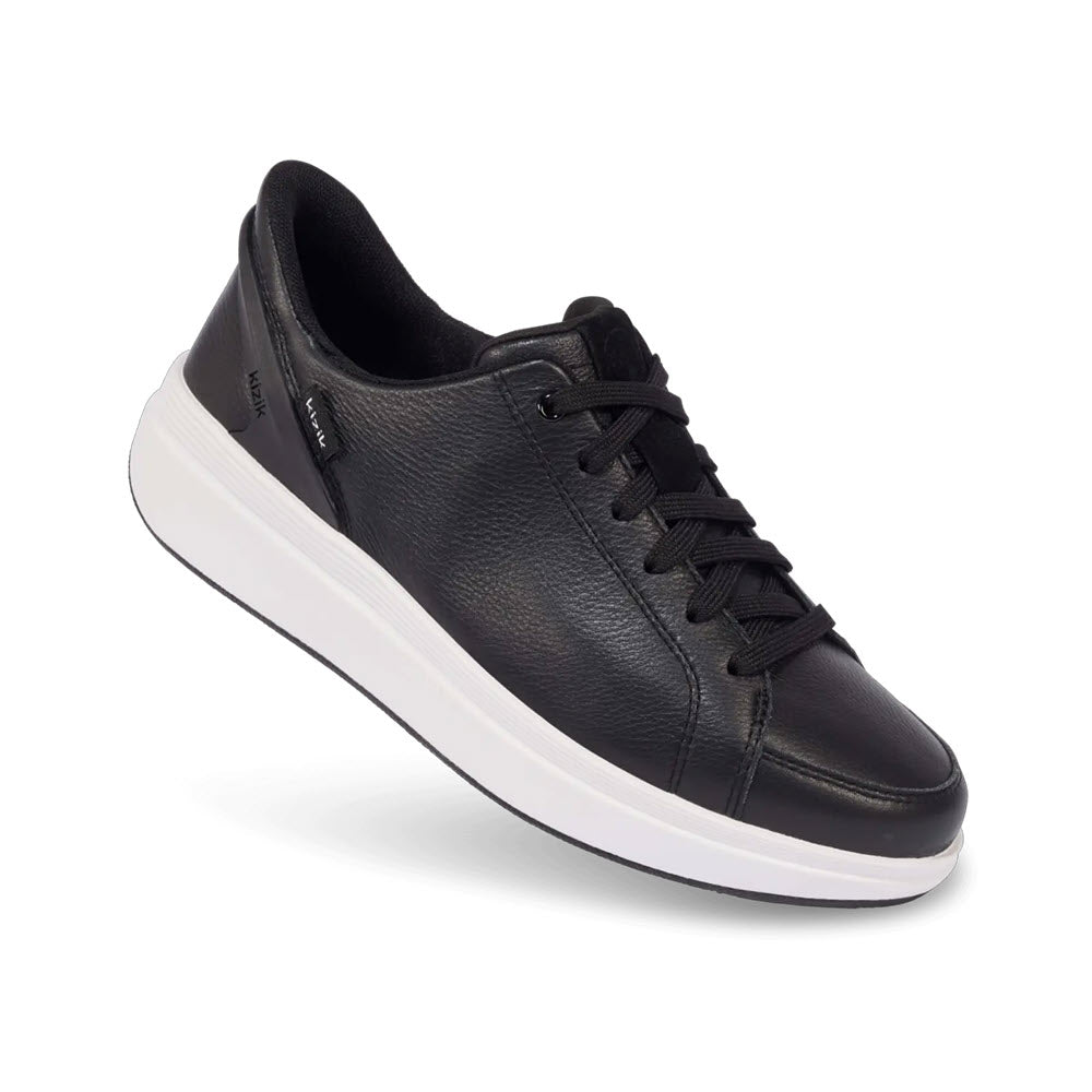 Sentence with replaced product:
Black leather Kizik Sydney Black sneaker with white soles and laces on a white background.
