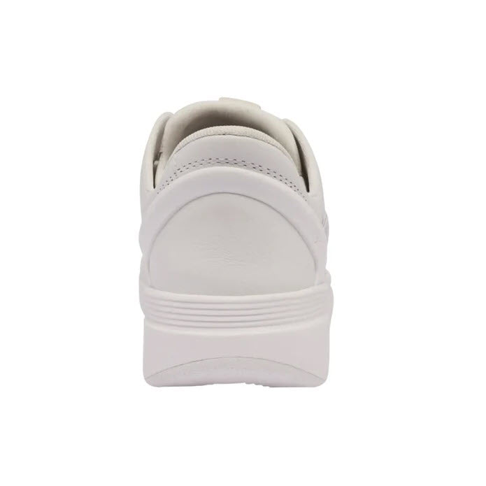 Rear view of a KIZIK SYDNEY WHITE - WOMENS sneaker showing its back and Rabbit Foam® outsole on a white background.