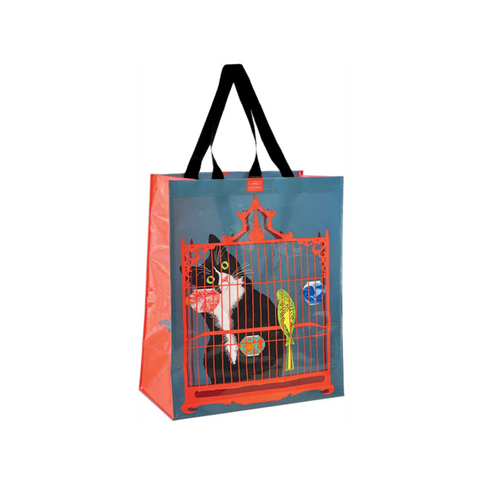 A Linnea reusable grocery bag with a colorful design featuring a cat behind a birdcage, surrounded by flowers, primarily red and black in color.