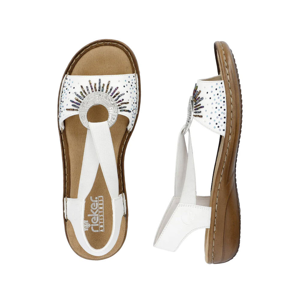 A pair of Rieker women&#39;s slingback flats with ornament details in white, displayed against a white background.