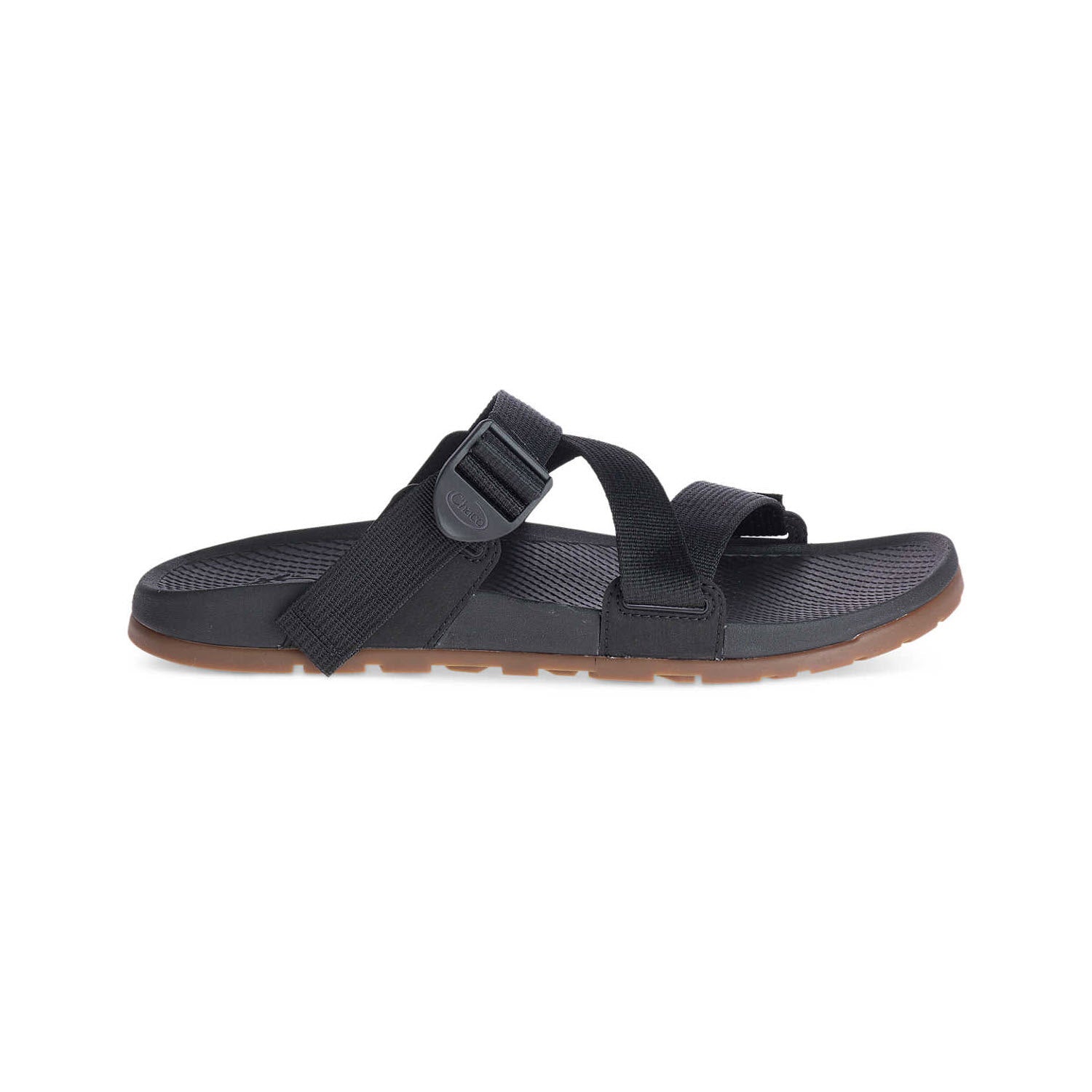 A single Chaco Lowdown Slide Woven Black - Mens sandal with velcro straps and a brown sole, isolated on a white background.