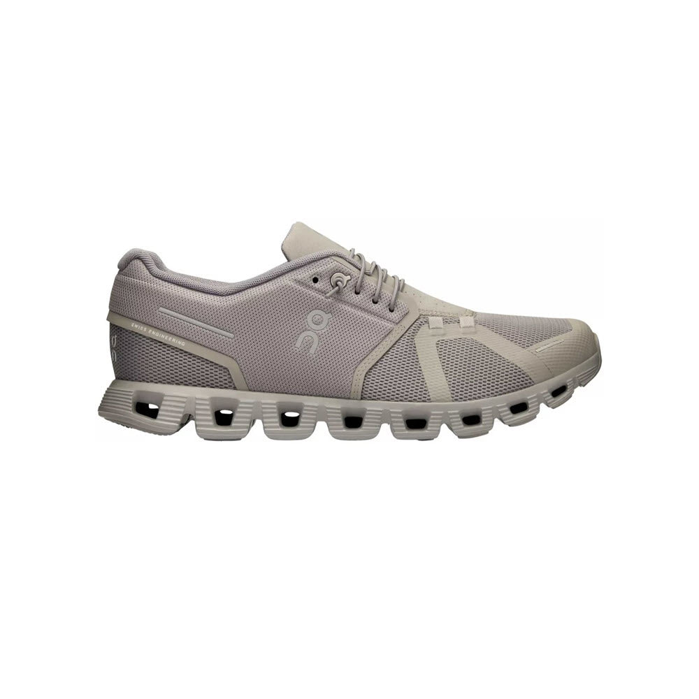 A single beige ON CLOUD 5 FOG/ALLOY - MENS running shoe with a thick, segmented sole featuring CloudTec® and various textured panels, viewed from the side.