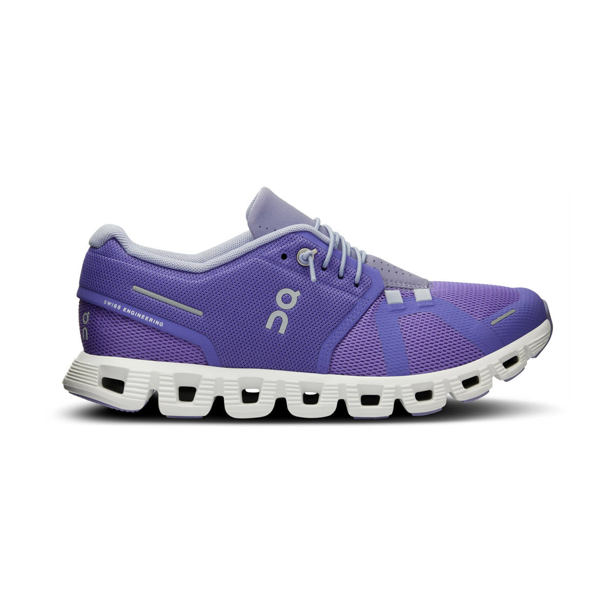 A single blueberry-colored ON Running Cloud 5 athletic shoe with white laces and an improved fit, featuring a unique segmented sole, isolated on a white background.