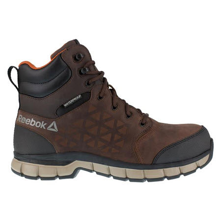 A single brown Reebok Work Comp Toe Sublite Cushion Mid Brown Boot with a high-top design, composite toe, and treaded, slip-resistant outsole.