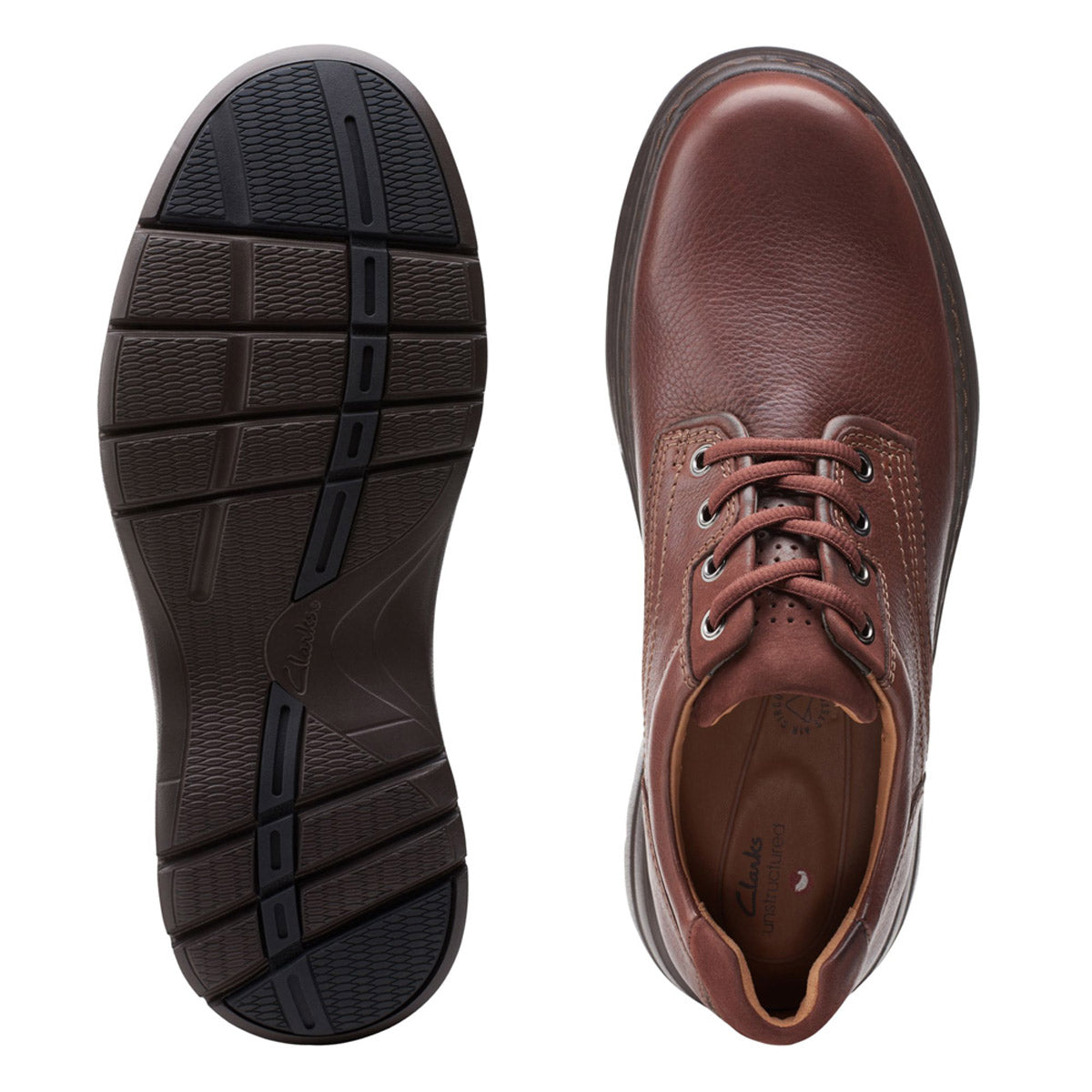 A pair of Clarks Un Brawley Pace mahogany full-grain leather dress shoes with laces, shown from above and sole view.