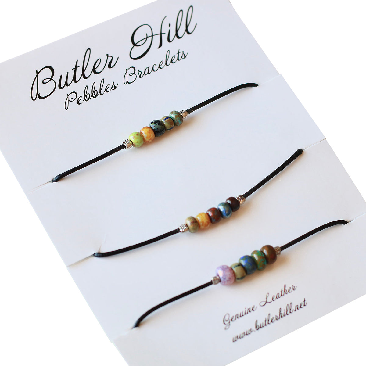 Three Butler Hill Pebble Bracelet Packs Small on a display card, featuring natural European leather bands.