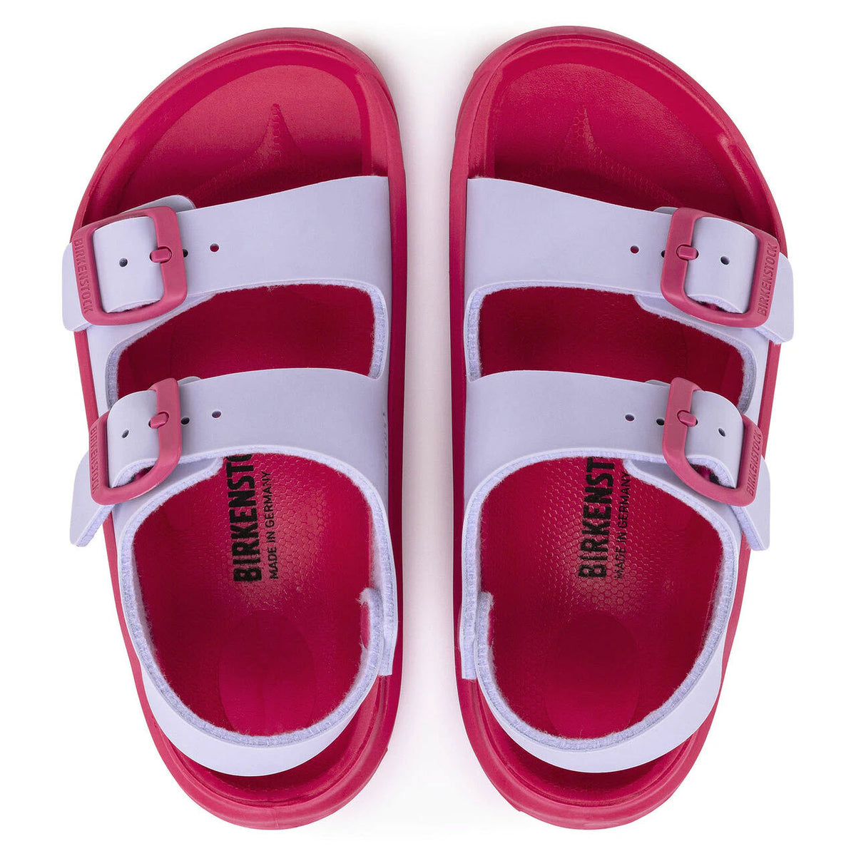 A pair of red and white Birkenstock Mogami slide sandals with adjustable straps and a waterproof footbed.
