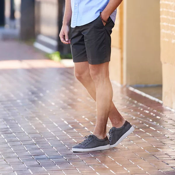 Man standing outdoors wearing shorts and Nunn Bush Kore City Walk 2 Gray - Mens casual shoes with a Comfort Gel footbed.