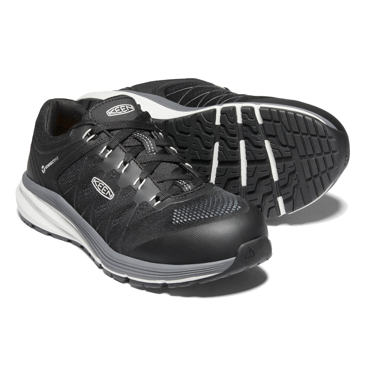 A pair of black Keen Composite Toe Vista Energy Vapor/Black - Men&#39;s athletic shoes with safety toe work shoe features, on a white background.
