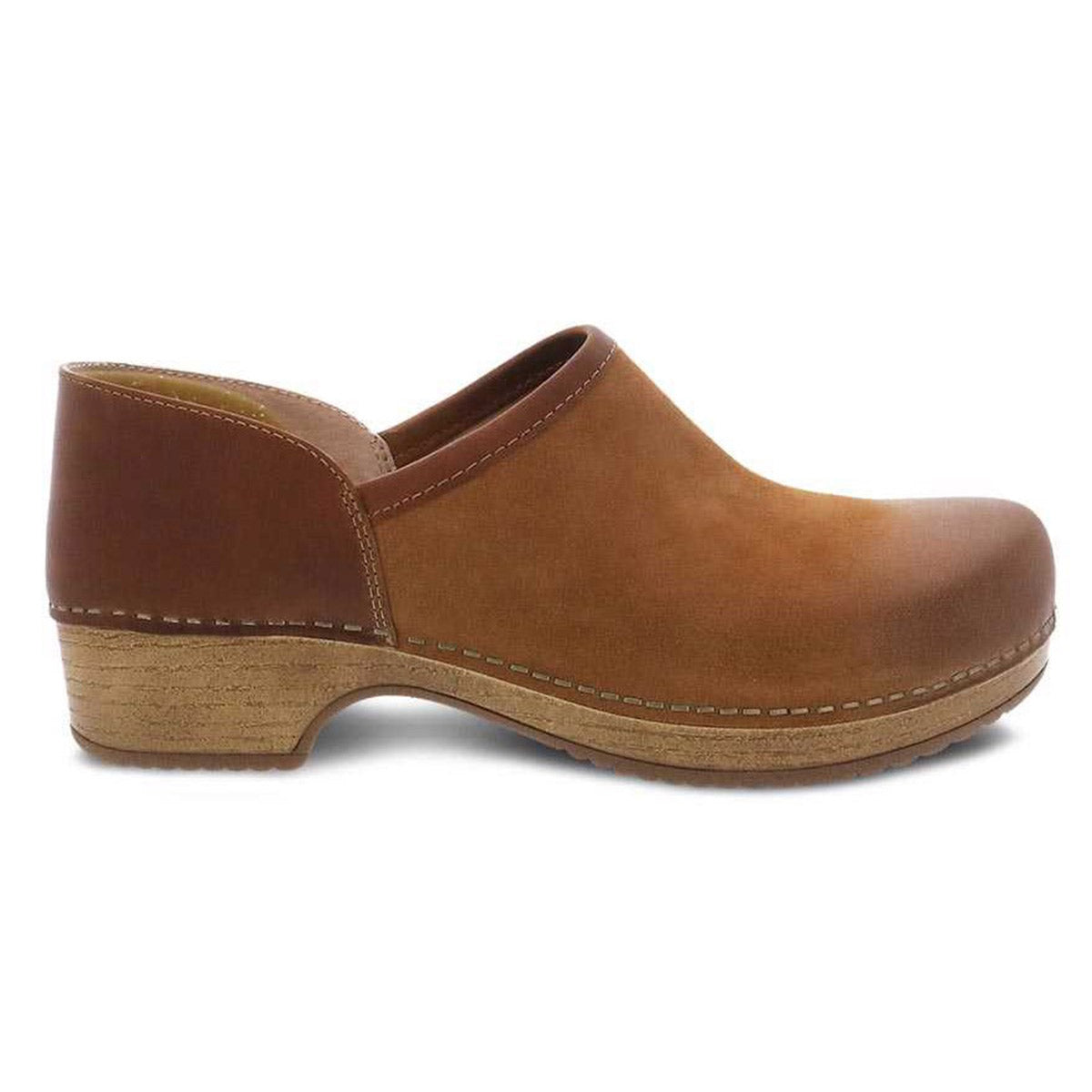 Dansko Brenna Tan Burnished Suede clog with wooden sole on a white background.