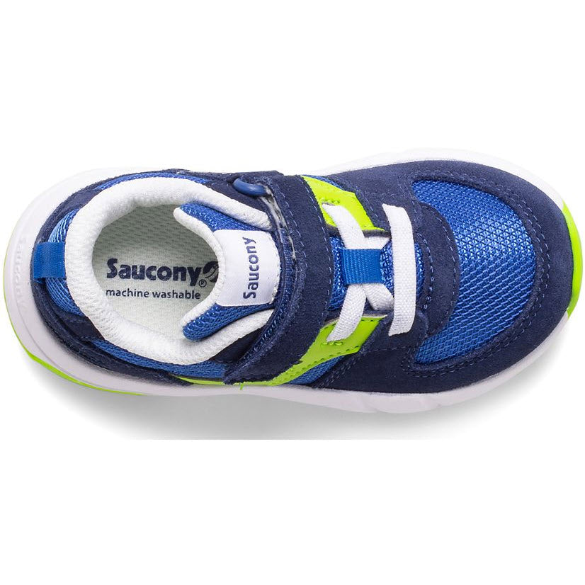A child&#39;s blue and neon green Saucony Jazz Lite 2.0 Navy/Silver sneaker with a velcro strap, featuring reinforced toes, labeled as machine washable.