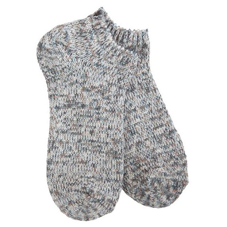 A pair of Worlds Softest knitted woolen socks with a space-dye pattern.