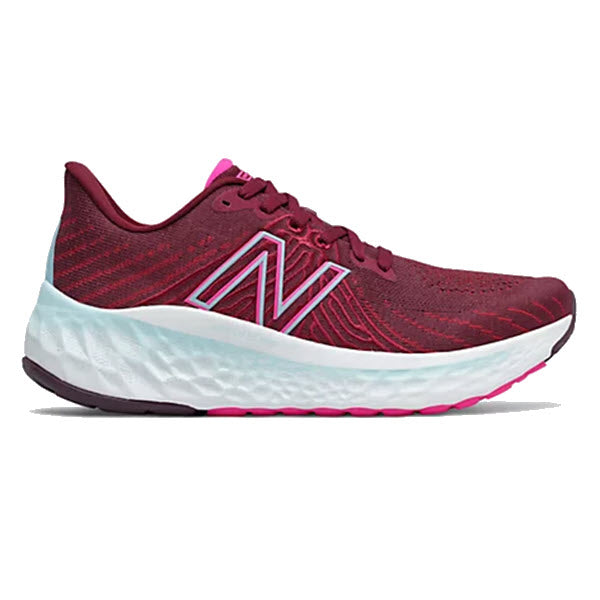A single red New Balance FRESH FOAM VONGO V5 GARNET/PINK GLO stability running shoe with a white sole.