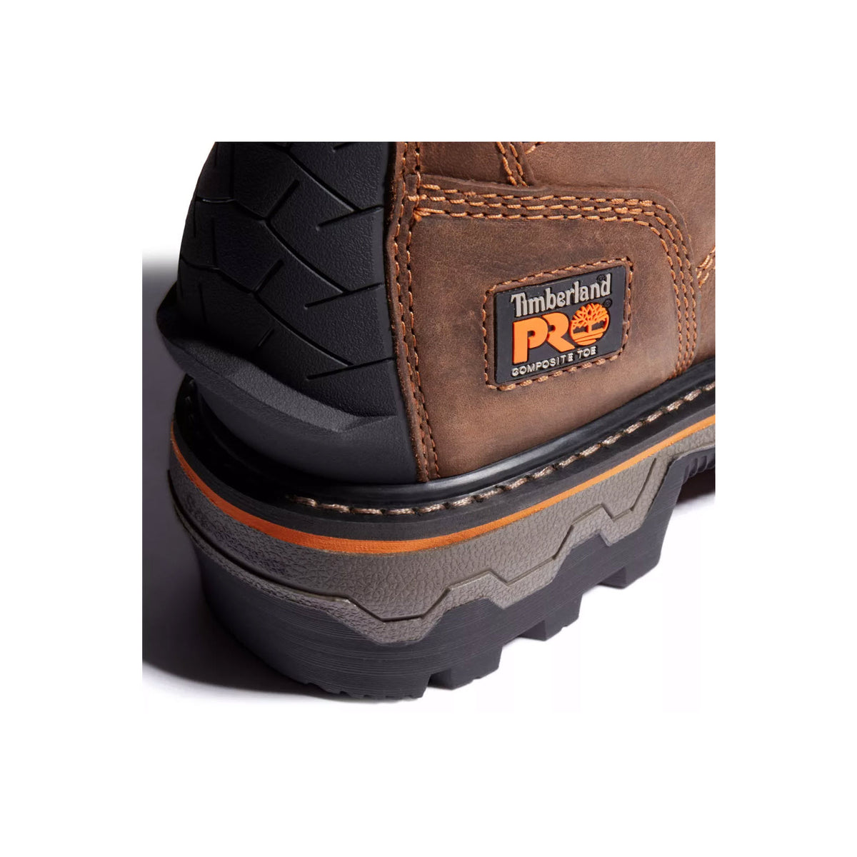 Close-up of a Timberland Pro Boondock HD Comp Toe Logger Brown - Mens work boot highlighting the brand label and tread pattern.