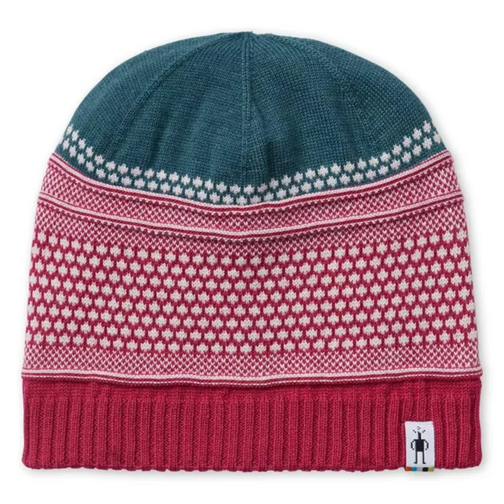 Smartwool Merino wool knitted winter beanie with a red and white snowflake pattern and a teal crown.
