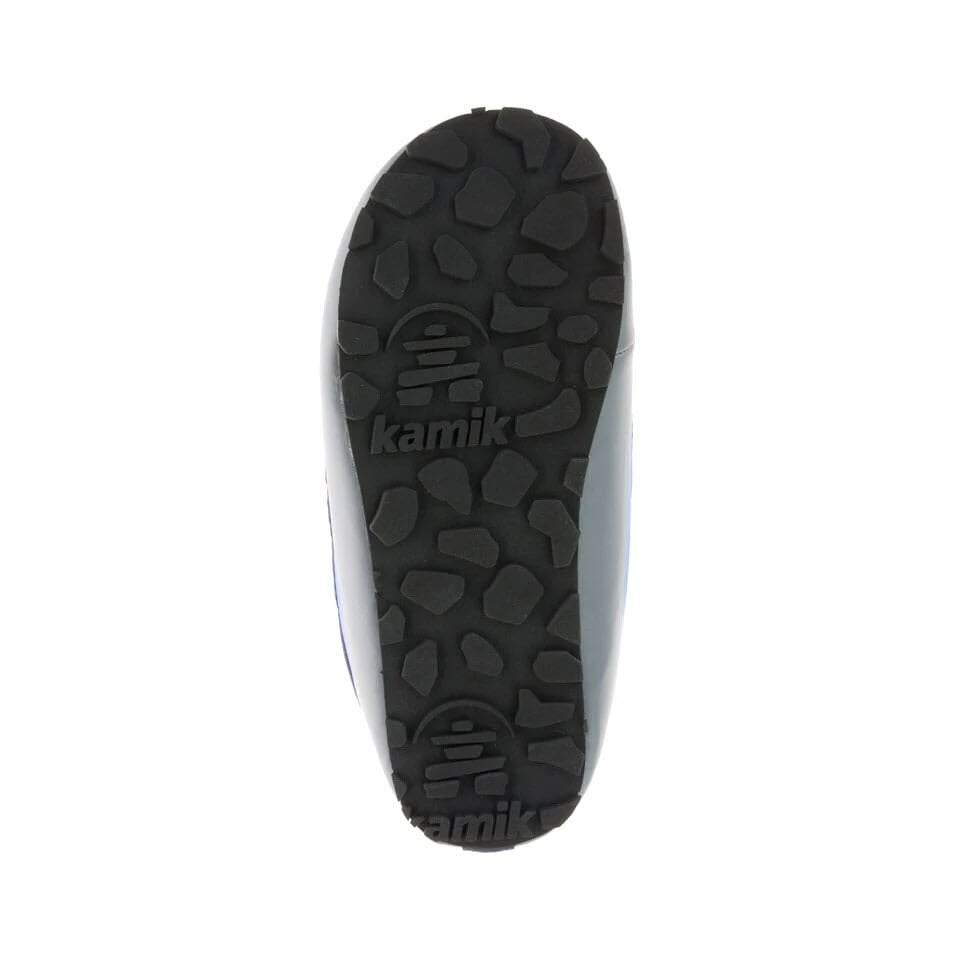Sole of a Kamik Puffy Navy slipper displaying tread pattern and Kamik logo.
