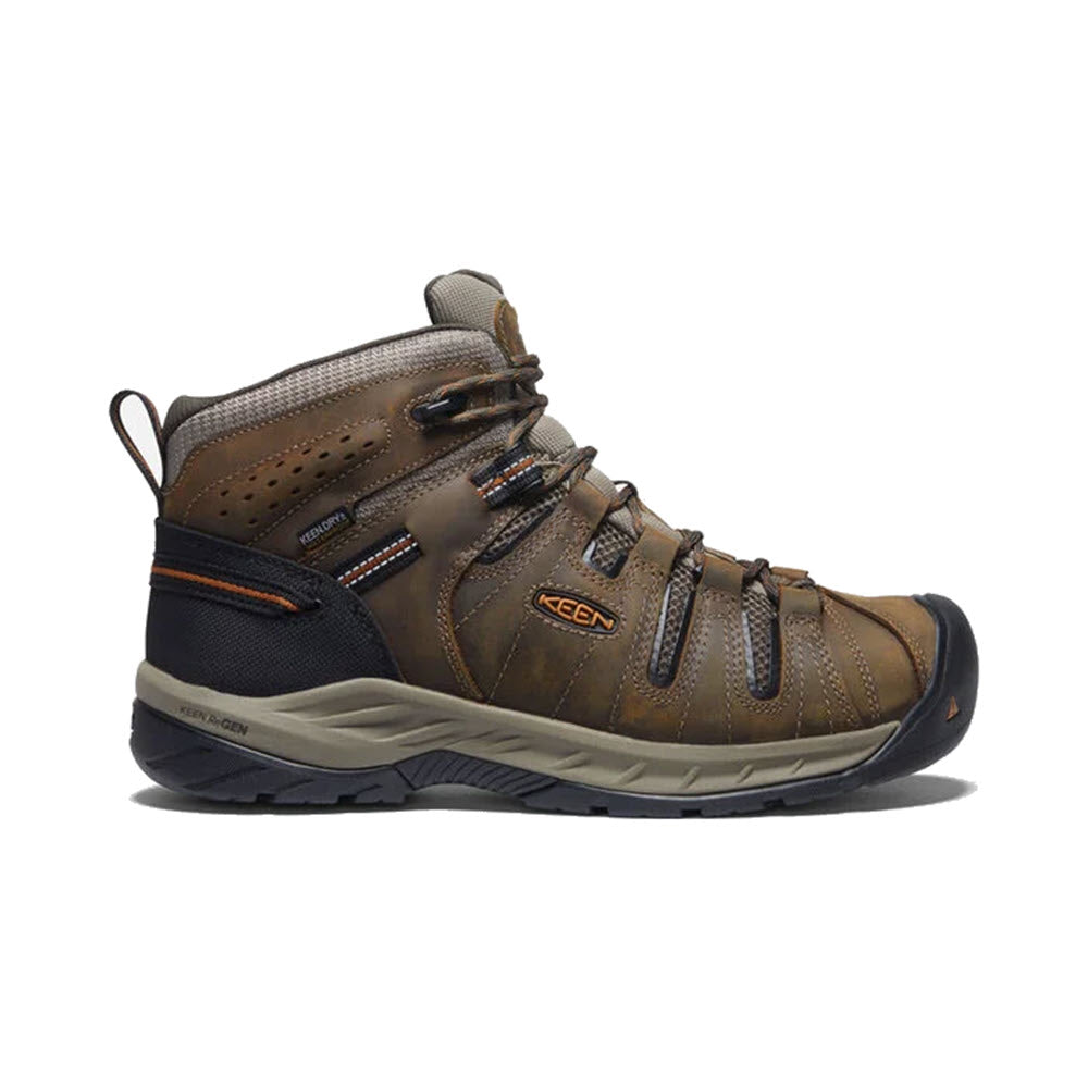 A single Keen Flint II Mid WP Soft Toe work boot with laces on a white background.