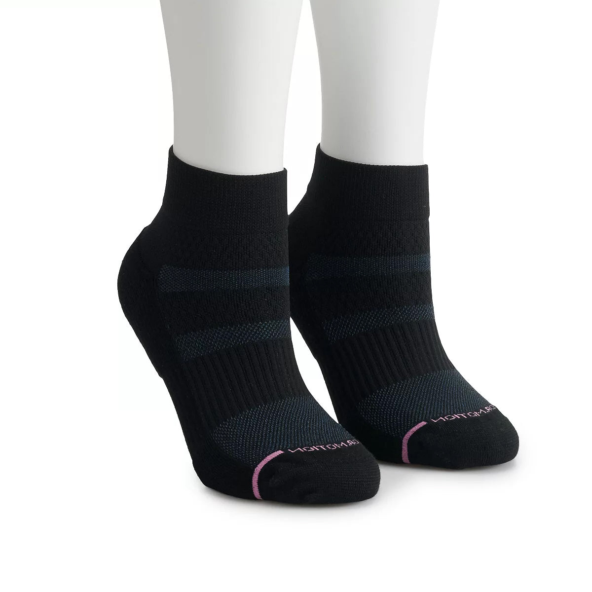 Pair of Dr. Motion ankle compression solid black socks on a mannequin's feet against a white background.