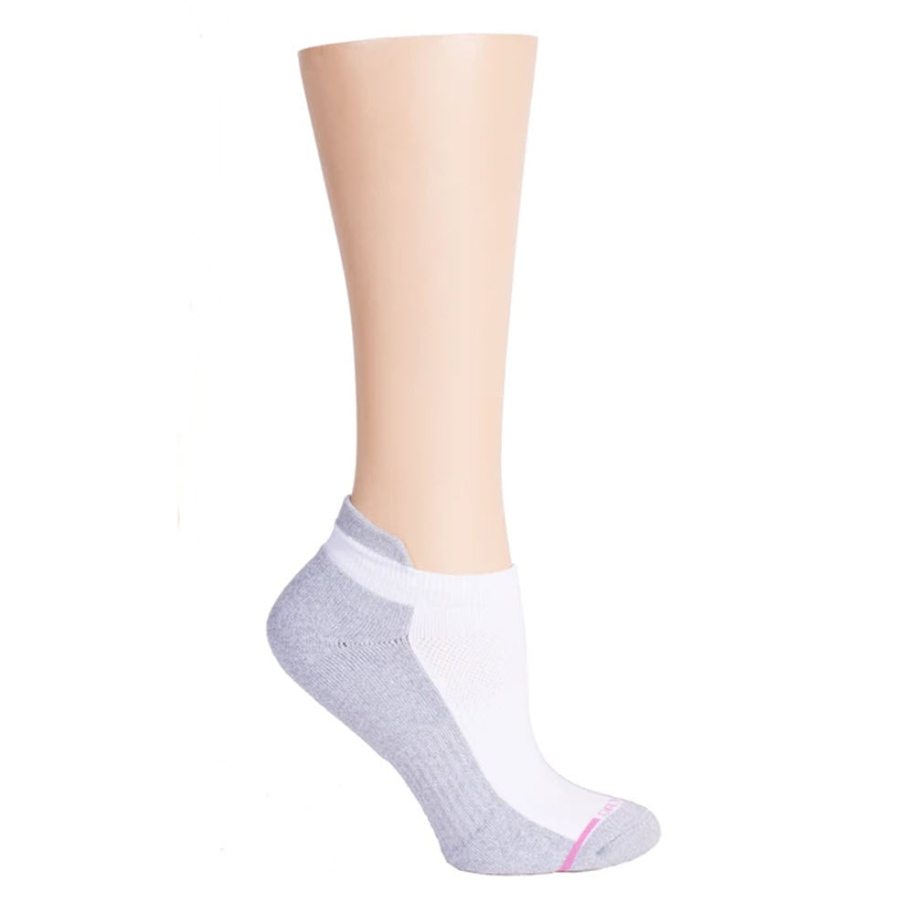 A mannequin foot wearing a DR. MOTION ankle compression white sock from Soxland, featuring an anti-microbial & anti-odor breathable mesh upper.