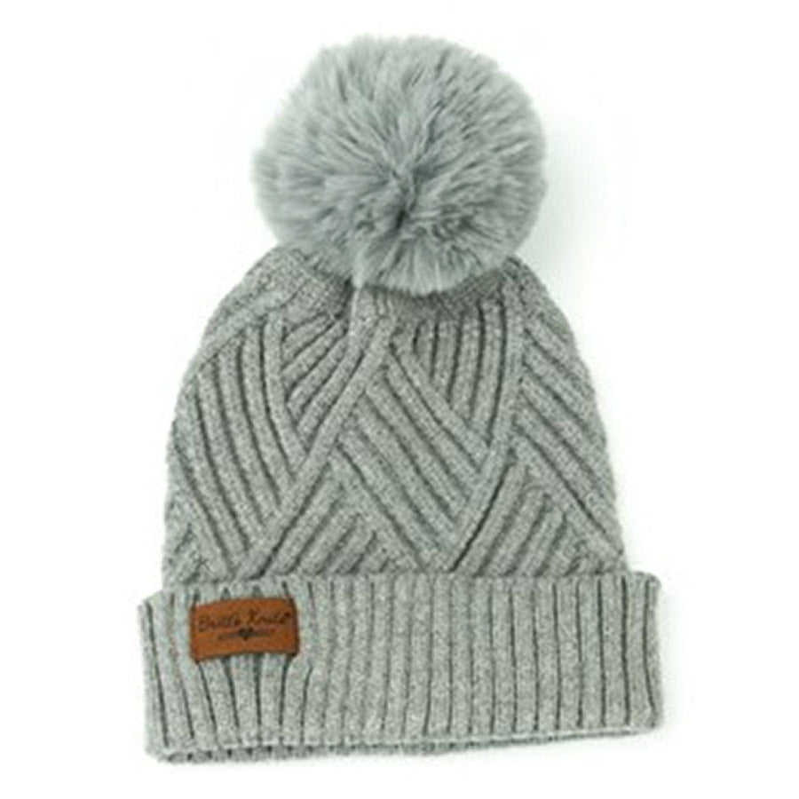 Gray BRITTS KNITS KIDS POOF POM HAT with an ultra-plush pom and a logo patch on the cuff.