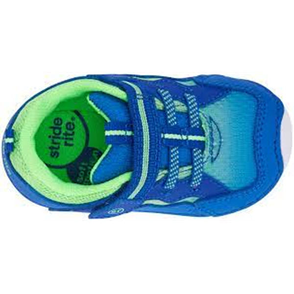 Top view of a blue Stride Rite Soft Motion Kylo Sneaker with green insole and velcro straps.