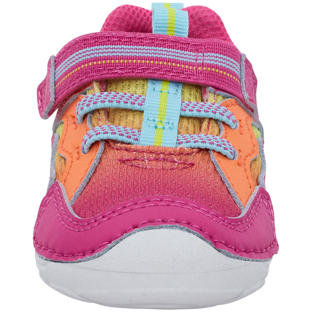 Colorful Stride Rite Soft Motion Pink Neon Toddler Sneaker with pink and orange details and multicolored laces.