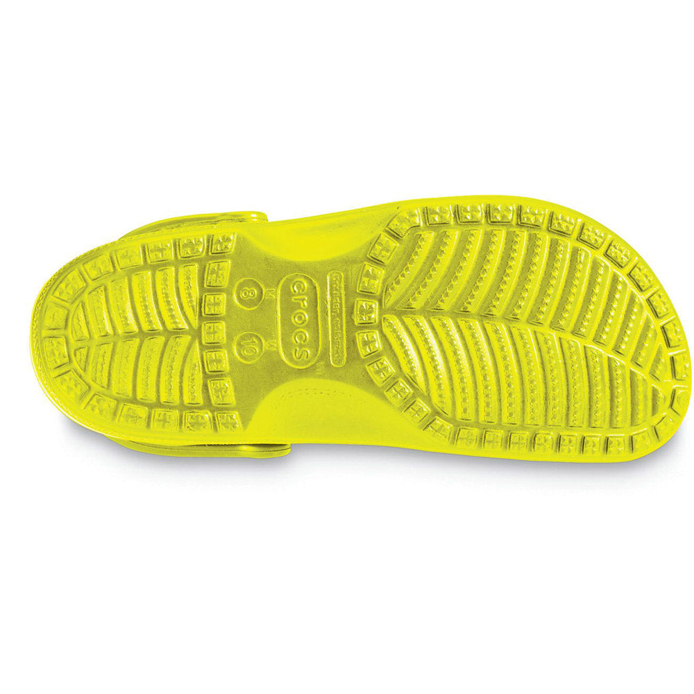 Neon yellow Crocs Women&#39;s Classic Citrus shoe sole displaying tread pattern and branding. 
Product Name: Crocs Women&#39;s Classic Citrus 
Brand Name: Crocs