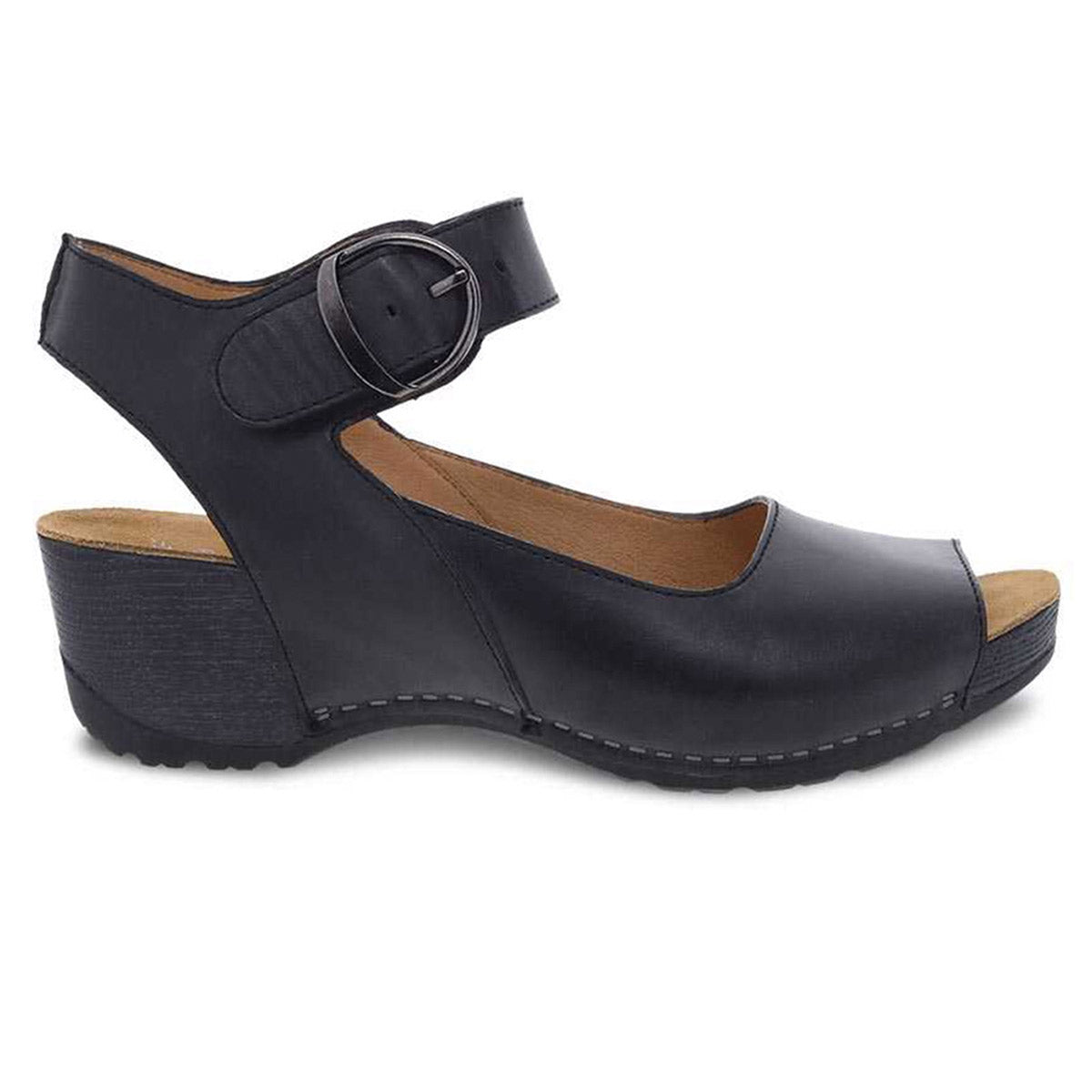 Dansko Tiana black burnished sandals: Black leather linings platform sandal with an ankle strap.