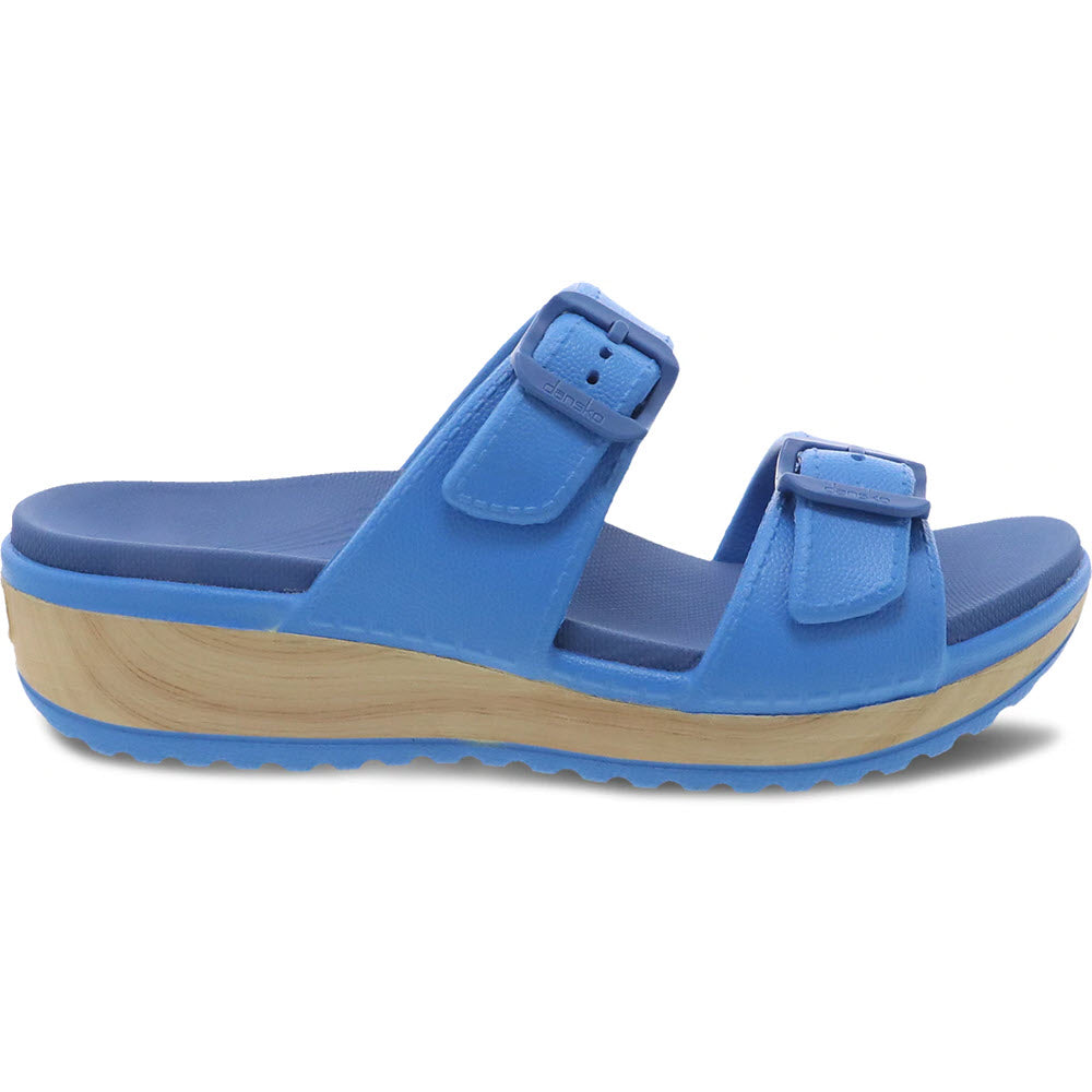 Blue Dansko Kandi summer sandal with a platform sole.